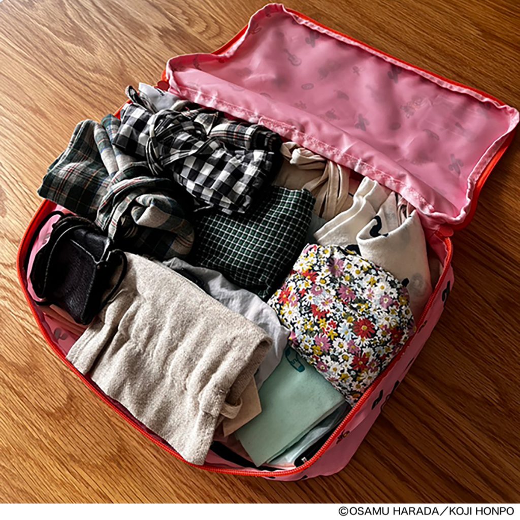 詰め込んでもWファスナーなので、収納が可能。