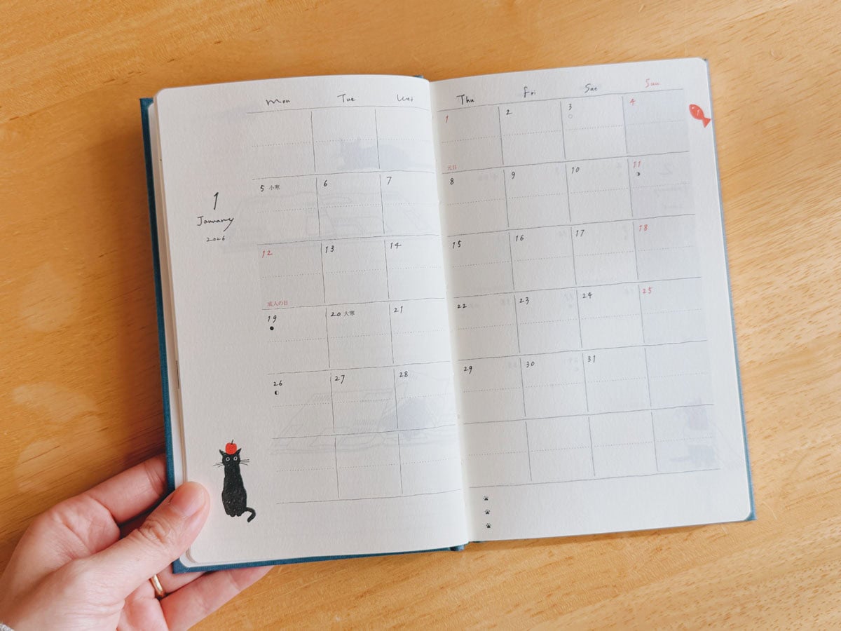 手帳の中には、小泉さよさんが描く、かわいい猫がいっぱい!