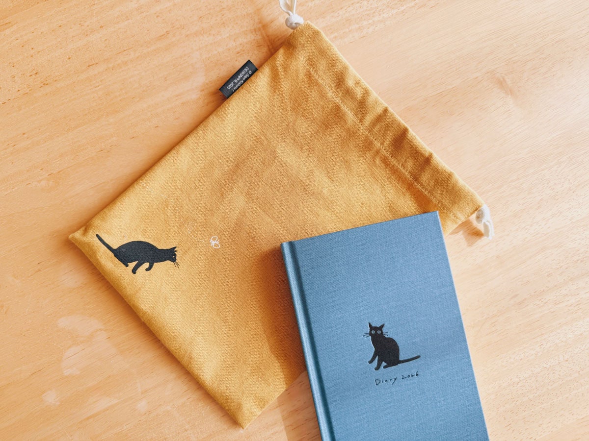 巾着と手帳の限定セットも