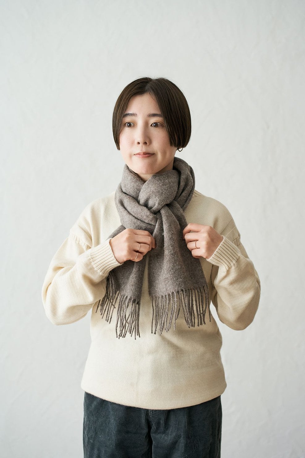 マフラーの形を整えたら、ミラノ巻きの完成