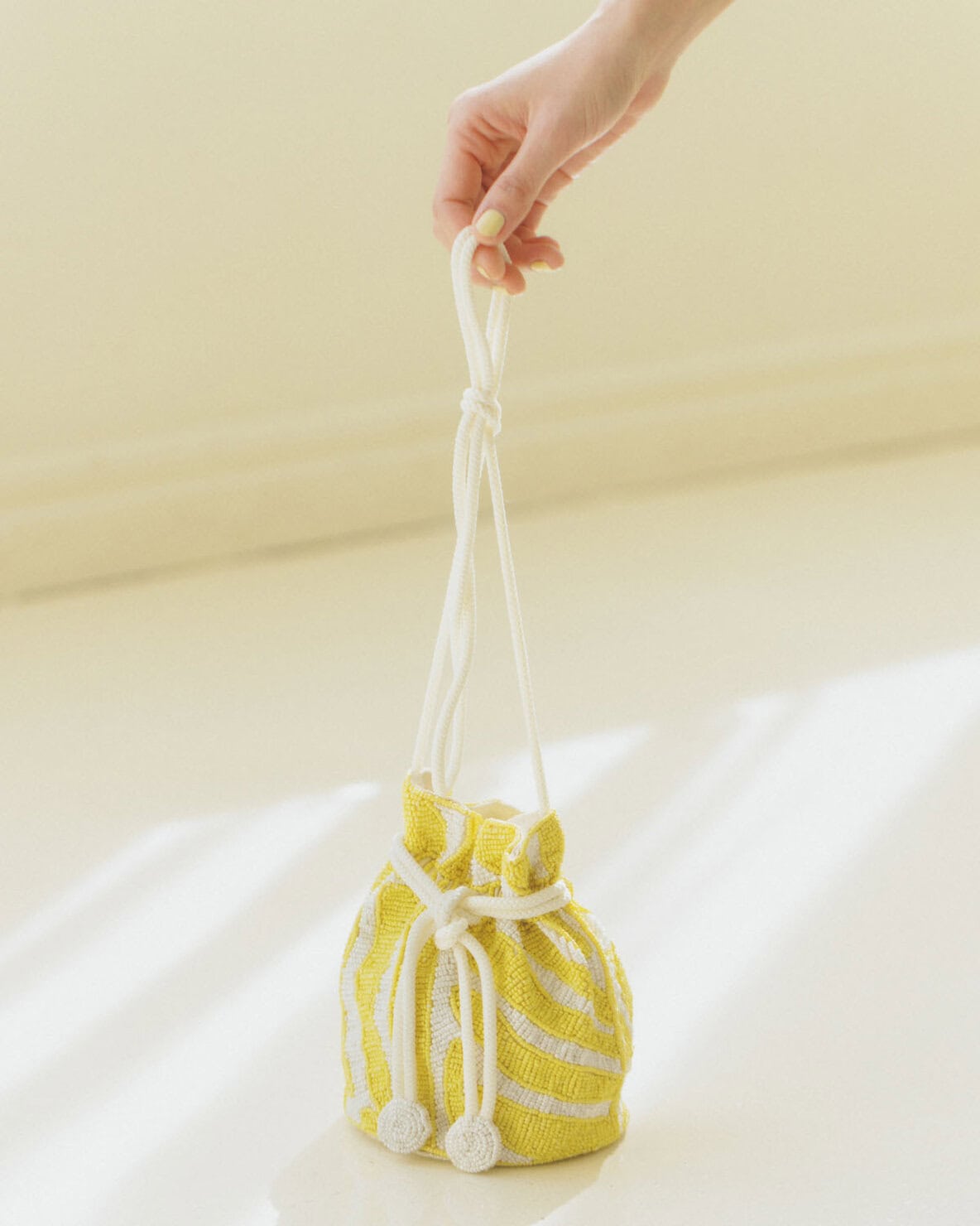 MARCHERのビーズ巾着バッグ