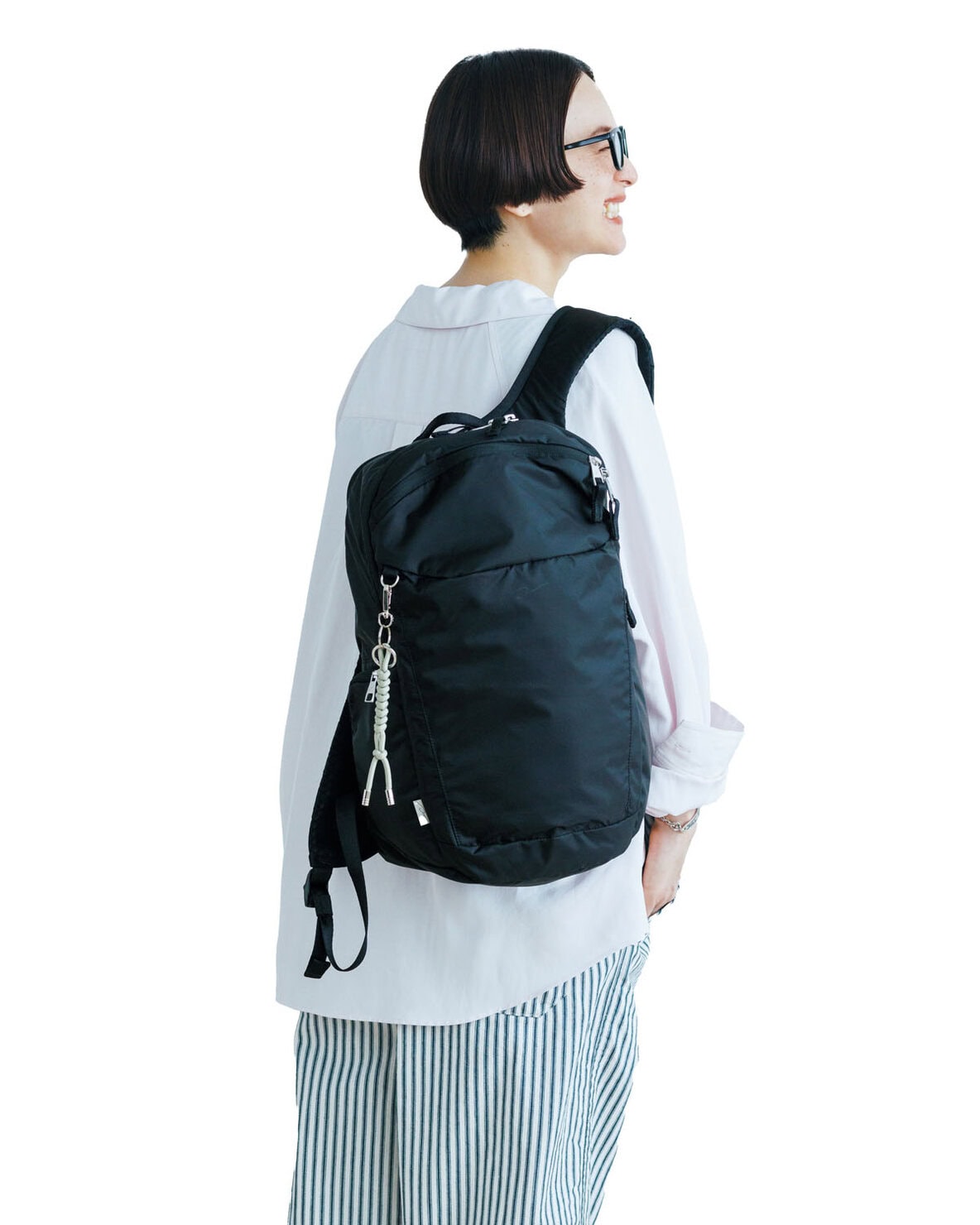 W&.Day/Nightのリュックを高山都さんが着用